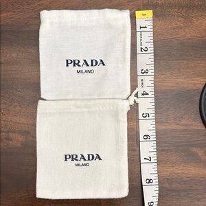 Prada Cream Logo Drawstring Pouches